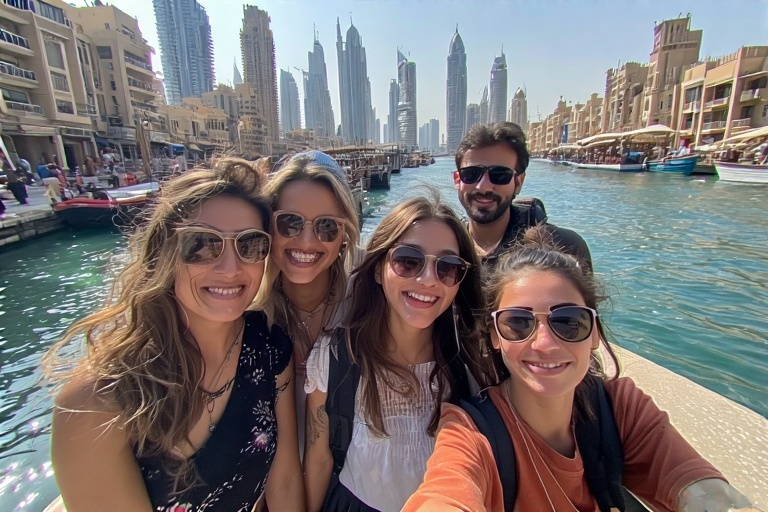 Visitors enjoying a traditional abra ride during a Dubai city tour